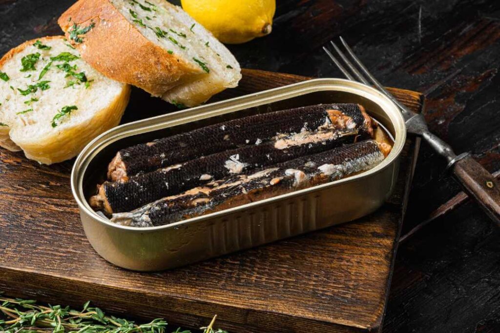 Open canned fish as a meal with herbed bread