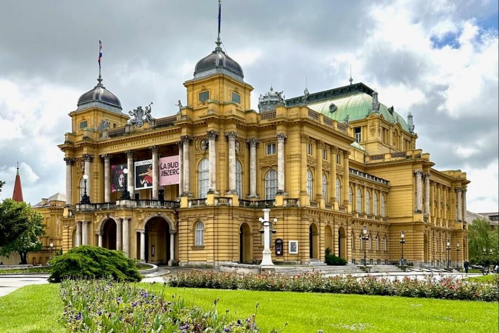 Neo-baroque architecture style beautiful yellow Croatian National Theater in Zagreb, designed by famous Viennese architects