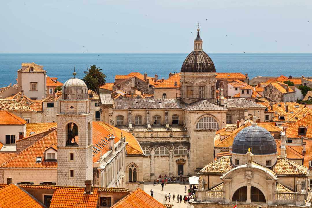 View of St Blaise's Church, the Cathedral of the Assumption of the Virgin Mary, the old town and the sea from the city walls of Dubrovnik, Croatia