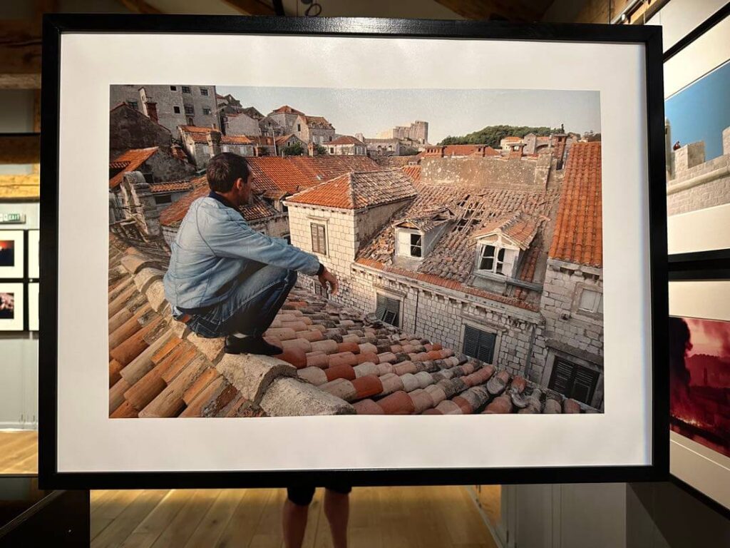 Journalism photos of Yugoslavia war, the damaged tile roofs of Dubrovnik in particular, at War Photo Limited in Dubrovnik, Croatia