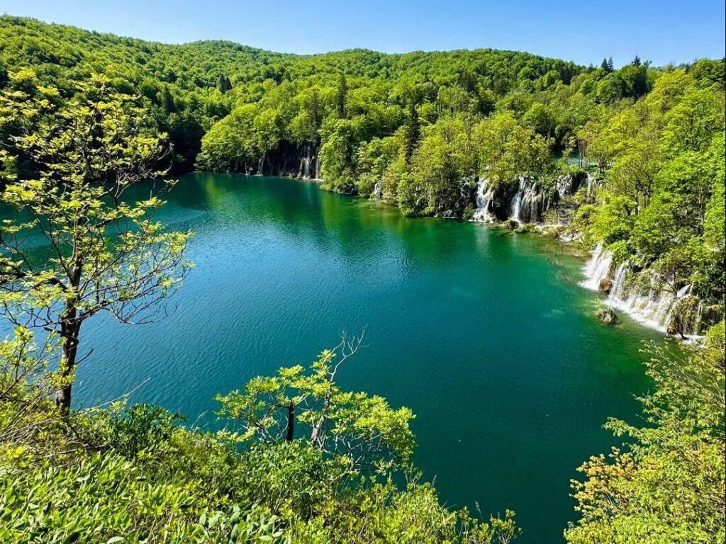 View of lush Upper Lakes with bigger lakes and waterfalls in Plitvice Lakes National Park, Croatia