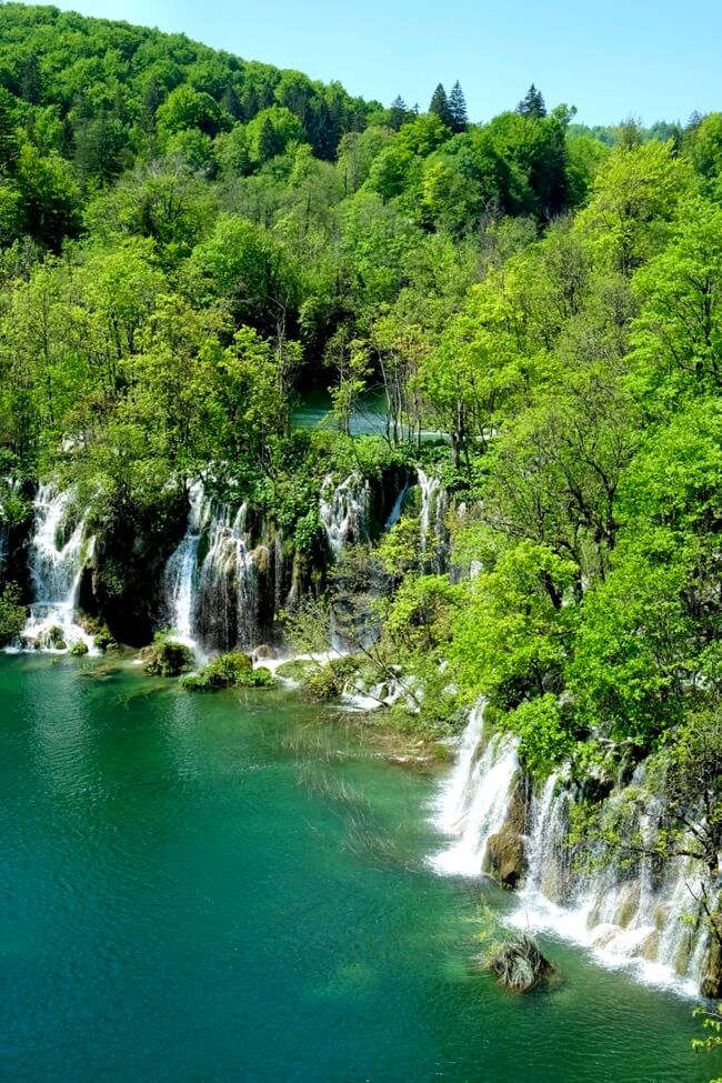 View of stacked up lakes, trees and waterfalls in Upper Lakes, Plitvice Lakes National Park, Croatia
