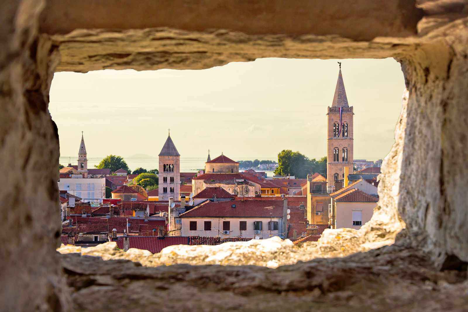 Aerial view of the Zadar old down through a stone window in Croatia