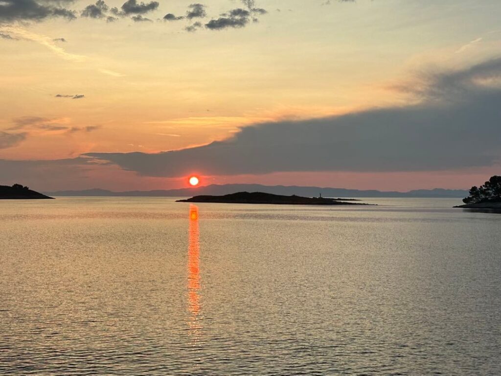 Sunset view of Adriatic sea and Korcula from Pomena in Mljet National Park, Croatia