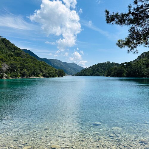 Calm saltwater swimming spot with a view of mountains in Mljet National Park, Croatia