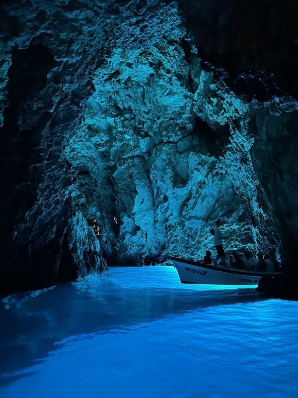 Inside the blue cave on the island of Vis by a boat tour, Croatia.