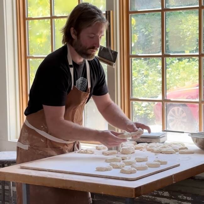 Hole Doghnunts made to order doughnuts, staff shaping the doughnut dough ready for frying. Asheville, North Carolina